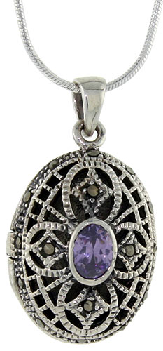 STERLING SILVER MARQUESITE FILIGREE OVAL LOCKET.